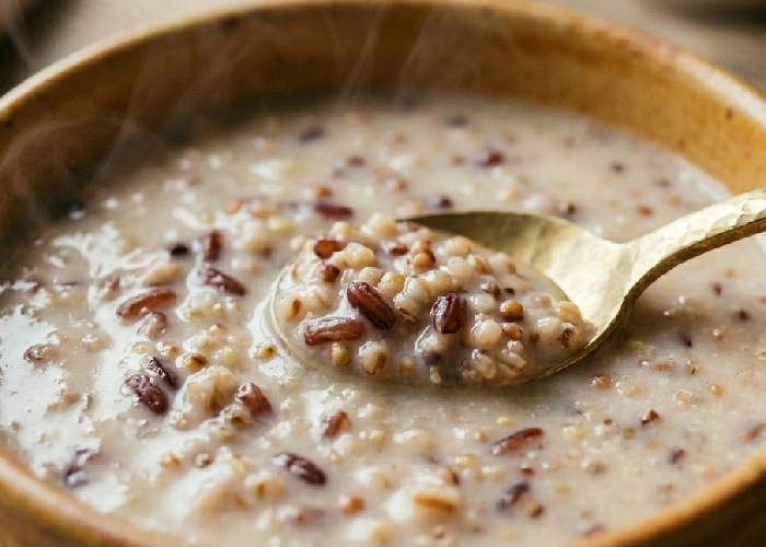 Warm rice congee with red rice and millets