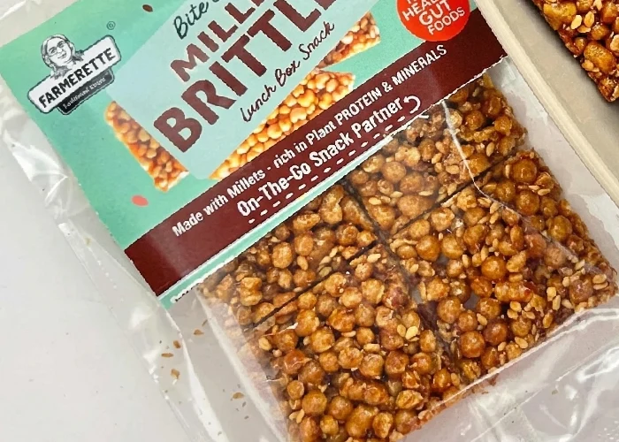 Packaged oil free snacks made from millets and seeds.