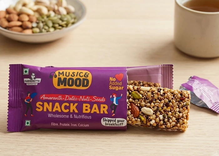 Pack of 2 Farmerette premium nut-based quick snacks kept on a clean table surface.