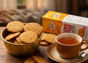 Crunchy sugar free biscuits placed on a wooden board next to evening tea